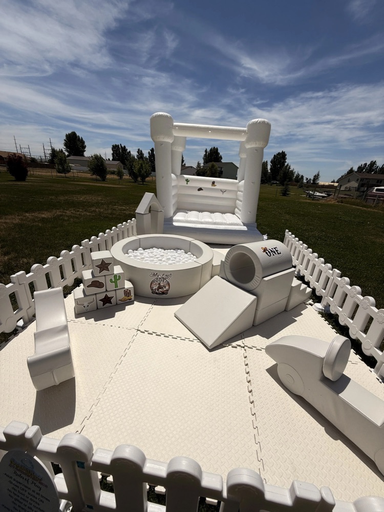 Deluxe Dreamy Denz outdoor rodeo-themed bounce house, soft play, and ball pit